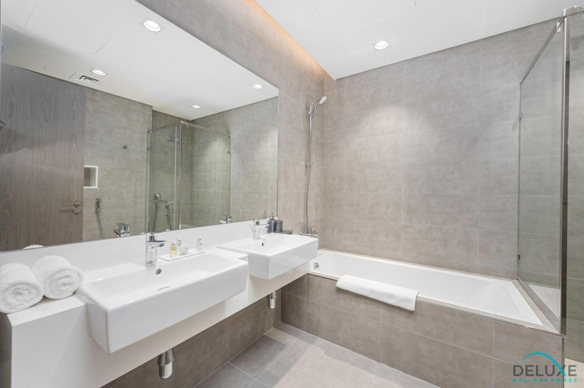 Lush 2br In District One Phase Iii, Mbr By Deluxe Homes *